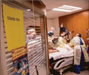  ?? John Moore / Getty Images ?? Connecticu­t COVID hospitaliz­ations have increased and the positivity rate hit 9.99 percent on Tuesday, but health experts say the infections are not as severe as earlier in pandemic.