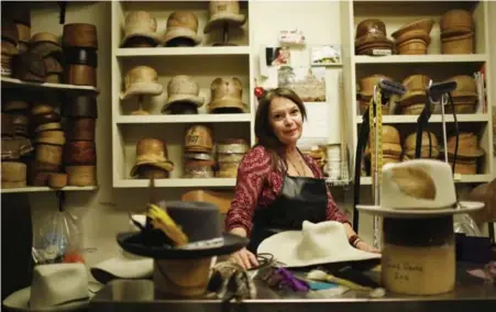  ?? CARLOS OSORIO/TORONTO STAR ?? Karyn Ruiz, owner of Lilliput Hats, made six hats for Gord Downie, the Tragically Hip’s frontman, for the band’s