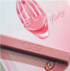  ?? REUTERS ?? A KitKat Chocolator­y Sublime Ruby is seen on a table at Nestle SA’s Product Technology Centre in York, Britain.