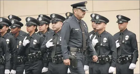  ?? Al Seib Los Angeles Times ?? LAPD CHIEF Charlie Beck conducts an inspection at a graduation ceremony for officers in 2016. The department, he said, “is my DNA.”