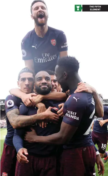  ?? | Reuters ?? Arsenal’s Alexandre Lacazette celebrates scoring in the Gunners’ 5-1 demolition of Fulham at Craven Cottage yesterday.