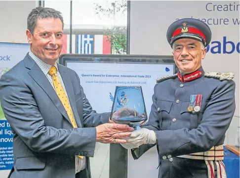  ?? ?? GONG: Lord-Lieutenant of Fife Robert Balfour presents the award to Babcock LGE managing director Neale Campbell.