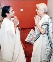  ?? — PTI ?? West Bengal chief minister Mamata Banerjee exchanges greetings with Nirmala Banerjee, mother of Indian-American Nobel Prize winning economist Abhijit Banerjee, in Kolkata on Wednesday.