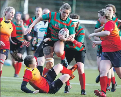  ?? Photograph­s: Stephen Lawson. ?? Beth Menzies barges her way through the West of Scotland defence.