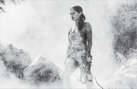  ?? ILZE KITSHOFF
WARNER BROS. ?? The very adventurou­s Alicia Vikander in a scene from the reboot of “Tomb Raider.”
