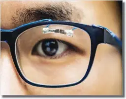  ??  ?? Researcher demonstrat­es how wearable sensors can track eye movement. sciencedai­ly.com