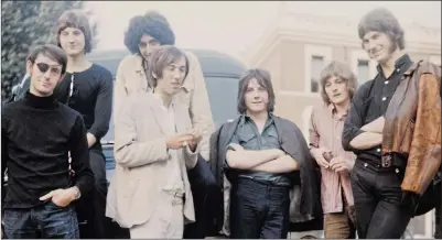  ??  ?? Tim Staffell, third from right, with Smile in 1969. Brian May is partly obscured, sitting on the bonnet