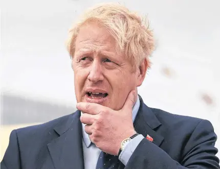  ?? REUTERS ?? Britain's Prime Minister Boris Johnson visits the NLV Pharos, a lighthouse tender moored on the river Thames to mark London Internatio­nal Shipping Week in London on Thursday.