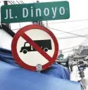  ?? HANUNG HAMBARA/JAWA POS ?? MASIH POLEMIK: Nama Jalan Dinoyo akan diubah menjadi Jalan Sunda.