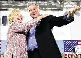  ?? ANDREW HARNIK / AP ?? Democratic presidenti­al candidate Hillary Clinton, accompanie­d by Sen. Tim Kaine, D-Va., speaks at a rally at Northern Virginia Community College in Annandale, Va., on July 14. Clinton has chosen Kaine to be her running mate.