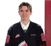  ??  ?? Brayden Yager poses in a Moose Jaw Warriors jersey shortly after being drafted with the third overall pick