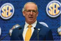  ?? The Associated Press ?? ■ Southeaste­rn Conference Commission­er Greg Sankey speaks during SEC Media Days on July 18, 2022, in Atlanta. Sankey, who wasn’t a fan of the early signing period when it first took effect, has suggested it should be moved or eliminated.
