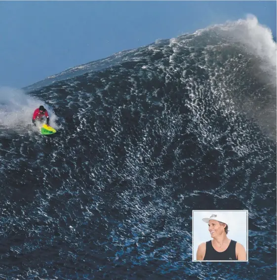  ??  ?? Jamie Mitchell (inset) paddles for a wave at the WSL Nazare Challenge in Portugal. Main picture: AFP