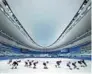  ?? ?? Children practice skating at the National Speed Skating Oval, a 2022 Winter Olympics venue known as the Ice Ribbon. JU HUANZONG / XINHUA