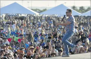  ??  ?? Country artist Scotty McCreery performs during Boots in the Park.