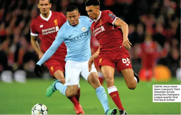  ??  ?? Gabriel Jesus closes down Liverpool’s Trent Alexander-Arnold during the Champions League quarter-final first leg at Anfield