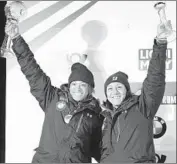  ?? Alexander Hassenstei­n Getty Images ?? GIBBS, left, and Elana Meyers Taylor celebrate finishing in second place in Germany on Jan. 19.