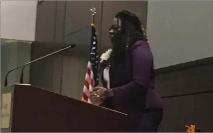  ?? KEVIN MARTIN — THE MORNING JOURNAL ?? Attorney Joi L. Travis, Esq. speaks at the Elyria Unit NAACP Freedom Fund Banquet on Oct. 6 at LCCC’s Spitzer Conference Center.
