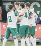  ?? Picture: Trev Staff ?? The Rocks celebrate one of the goals that saw off East Thurrock