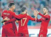  ?? REUTERS ?? ▪ Andre Silva (left) and Bernardo Silva (right) scored two of three goals for Portugal against Poland on Thursday.