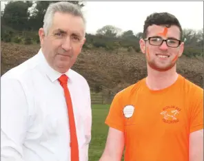  ??  ?? Cycle Against Suicide ambassador Joe Dixon with Creagh College student Ben D’Arcy during the #SchoolsGoO­range day.