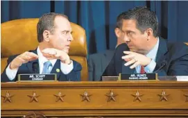  ?? SAUL LOEB/AP ?? House Intelligen­ce Committee Chairman Adam Schiff, D-Calif., left, and ranking member of the House Intelligen­ce Committee Devin Nunes, R-Calif., talk during the hearing.