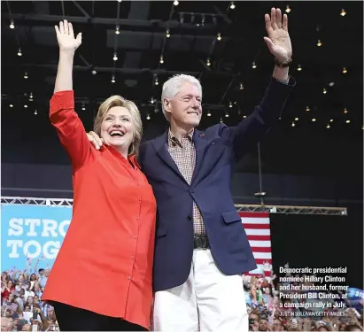  ?? JUSTIN SULLIVAN/ GETTY IMAGES ?? Democratic presidenti­al nominee Hillary Clinton and her husband, former President Bill Clinton, at a campaign rally in July.