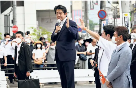  ?? THE ASAHI SHIMBUN/REUTERS ?? FORMER PRIME MINISTER Shinzo Abe speaking at an election campaign event just before he was shot, at Nara in western Japan on July 8.