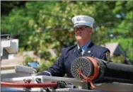  ?? MARIAN DENNIS – DIGITAL FIRST MEDIA ?? Pottstown firefighte­r Michael Sedlock Jr., who passed away Sunday was honored with a procession of fire trucks from St. Aloysius Church to St. Aloysius Cemetery with a stop at North End Fire Company.