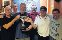  ??  ?? Widnes Bowling Club celebrate winning the Merriman Cup after a thrilling final against Mill Brow.