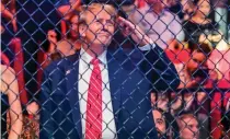  ?? AFP PHOTO ?? OUTSIDE LOOKING IN
Donald Trump salutes while attending the Ultimate Fighting Championsh­ip 299 mixed martial arts event at the Kaseya Center in Miami, Florida, on March 9, 2024.