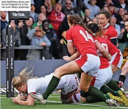  ?? ?? Alex Matthews dives over for an England try in the win over Wales yesterday