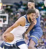  ?? FE ?? Karl Towns tuvo un aporte ofensivo de 21 puntos para Minnesota.