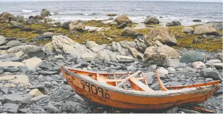  ?? ?? A wreck along a lonely Newfoundla­nd shore.