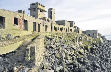  ?? Pictures: Central Scotland News Agency. ?? Inchmicker­y island in the Forth is known for its war-time buildings but the extent of others such as Stobs Camp, left, are now coming to light.