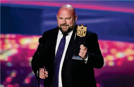  ?? David J. Phillip/Associated Press ?? AP Coach of the Year, the New York Giants’ Brian Daboll, speaks during the NFL Honors award show on Thursday in Phoenix.