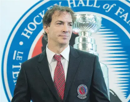  ?? — THE CANADIAN PRESS FILES ?? Joe Sakic has won gold medals at the World Junior Championsh­ips, the World Championsh­ips, and the Olympic Games, as well as the Stanley Cup.