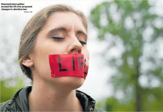  ?? Photo / AP ?? Demonstrat­ors gather around the US over proposed changes to abortion law.