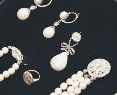  ??  ?? File photo shows ‘Queen Marie Antoinette’s Pearl’ (centre) pictured with other jewellery during a photocall for the sale of ‘Royal Jewels from the Bourbon Parma Family’ at Sotheby’s auction house in London. — AFP photo