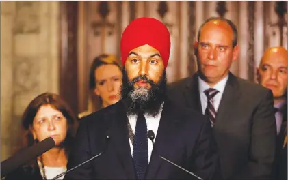  ?? CP PHOTO ?? NDP Leader Jagmeet Singh speaks about the harassment allegation­s against Saskatchew­an MP Erin Weir outside the House of Commons on Parliament Hill in Ottawa on Thursday.