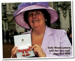  ??  ?? Sally Wood-Lamont with her very welldeserv­ed MBE