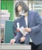  ?? REUTERS ?? President Tsai Ing-wen casts her vote at a polling station in New Taipei City.