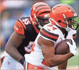  ?? / AP-Gary Landers ?? Cleveland Browns running back Nick Chubb (24) runs the ball in the second half of Sunday’s game against the Cincinnati Bengals in Cincinnati.