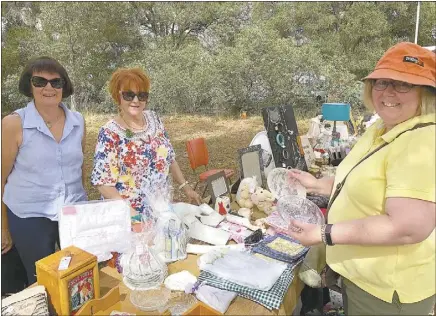  ??  ?? Jan Kelly, Maureen Kelly and Jackie Gravitis were finding plenty of Christmas gift items at the South Men’s Shed car boot sale on the weekend. PHOTO: DUBBO PHOTO NEWS