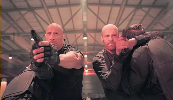  ??  ?? Dwayne Johnson, left, and Jason Statham in Fast & Furious Presents: Hobbs & Shaw.