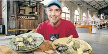  ?? Picture: WERNER HILLS ?? THE OYSTER DELI: Charl Gomes from the Douglas Deli shows off some of the oysters from his stall at the Goodnight Market held on Thursday evening