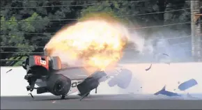  ?? GREG HUEY / AP ?? Sebastien Bourdais crashes into the wall during qualificat­ions for the Indianapol­is 500 on Saturday in Indianapol­is. The Coyne Racing driver sustained multiple fractures of his pelvis and a fractured right hip.