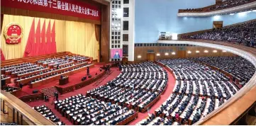  ??  ?? This general view shows a plenary session of the National People’s Congress (NPC) at the Great Hall of the People in Beijing. — AFP photo