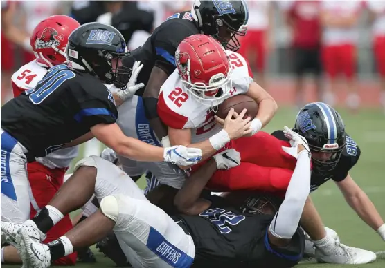  ?? ALLEN CUNNINGHAM/FOR THE SUN TIMES ?? Lincoln-Way East posted shutouts in the first two playoff rounds. Such defensive domination has made the undefeated Griffins heavy favorites in 8A.