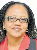  ?? CONTRIBUTE­D ?? Sandra Risden, paralegal at law firm Nunes, Scholefiel­d, DeLeon & Co, was murdered by gunmen as she travelled along Washington Boulevard in St Andrew on her way to work yesterday morning.